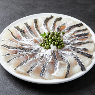 Elegant Sashimi-Style Fish Platter with Fresh Peppercorns